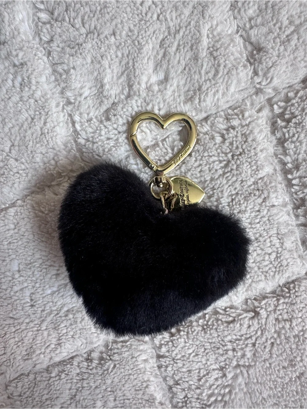 Juicy Couture | Black faux fur heart keychain charm featuring gold-tone Hardwear